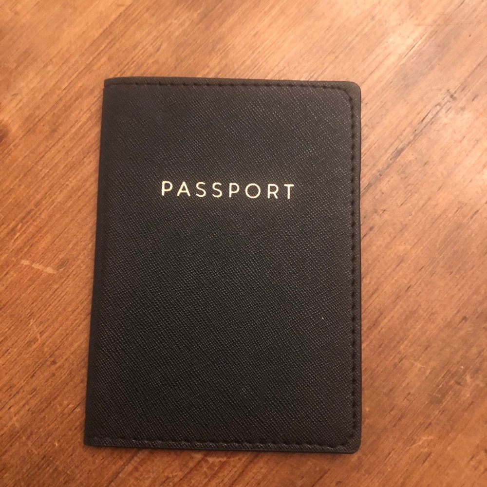 Black and gold passport cover
